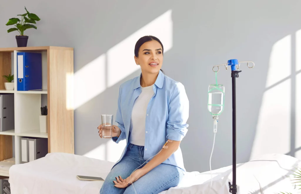 CBD IV Therapy in Elko NV – woman with IV drip on bed