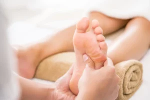 Foot reflexology massage for relaxation, better sleep, and headache relief at Elko Replenish Med Spa in Elko, Nevada