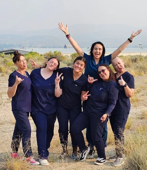 Elko Replenish Med Spa team members posing playfully outdoors